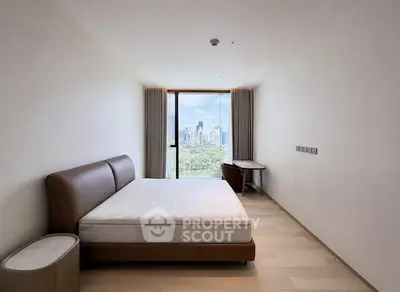 Spacious bedroom with city view in modern apartment