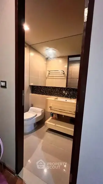 Modern bathroom with sleek fixtures and stylish tile accents