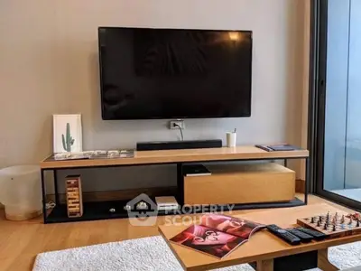 Modern living room with sleek TV setup and stylish decor