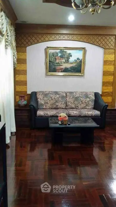 Elegant living room with classic decor and polished wooden flooring