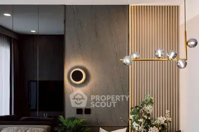 Modern living room with stylish lighting and elegant decor