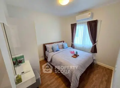 Cozy bedroom with modern decor and natural light