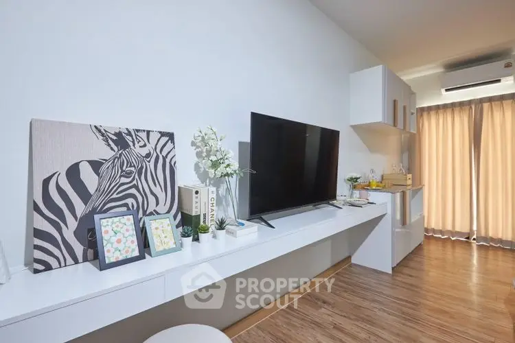 Modern living room with sleek TV setup and stylish decor