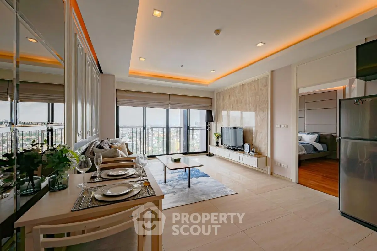 Modern open-plan living room with dining area and city view balcony.
