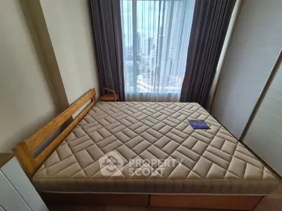 Modern bedroom with large window and city view, featuring a stylish bed and elegant decor.