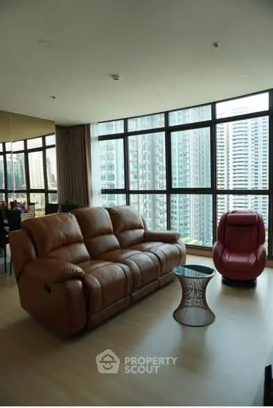 Luxurious living room with stunning city view and modern furniture