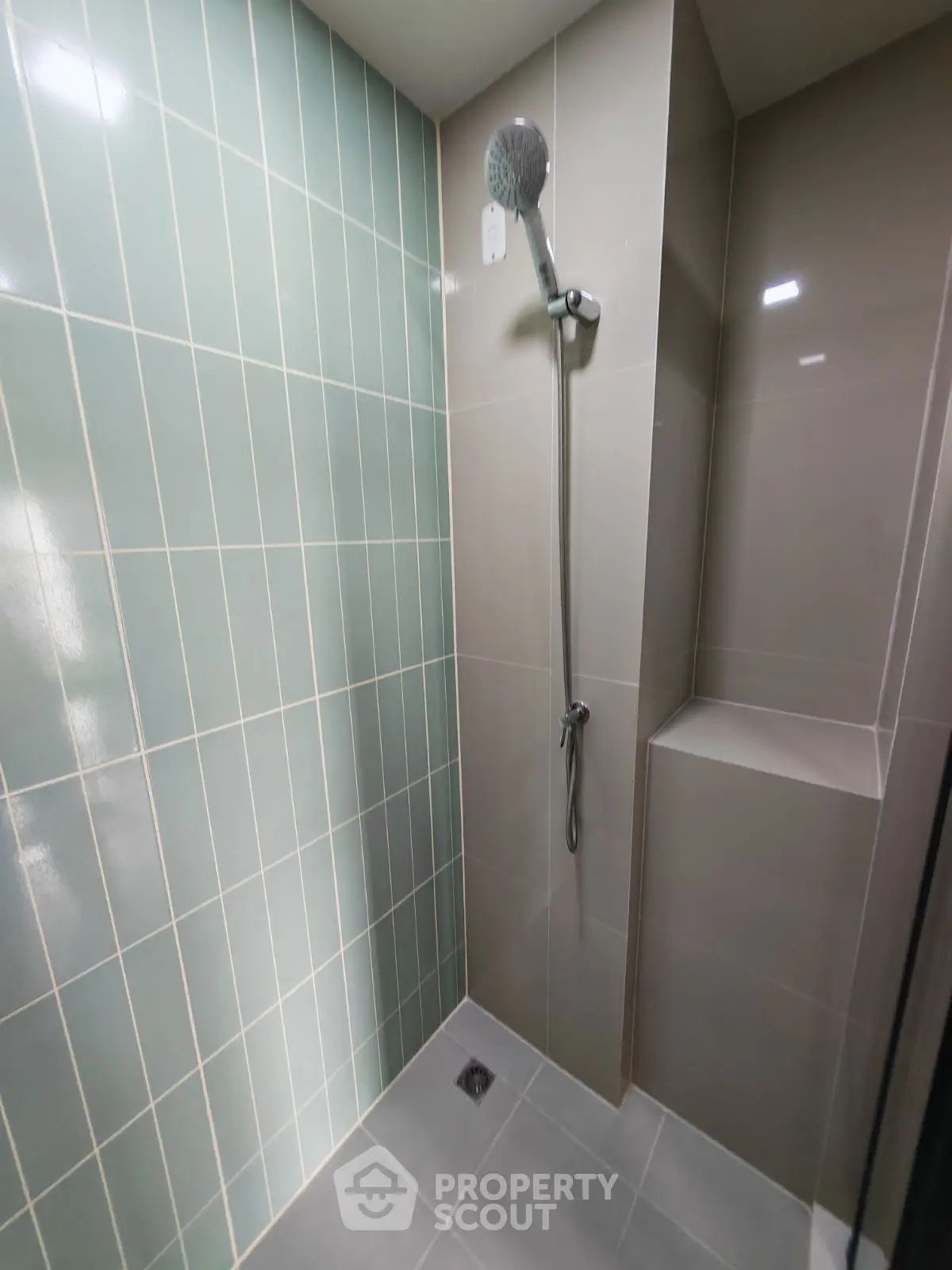 Modern bathroom with sleek shower design and stylish tiles