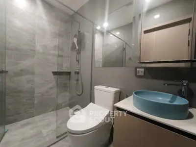 Modern bathroom with sleek design and glass shower enclosure