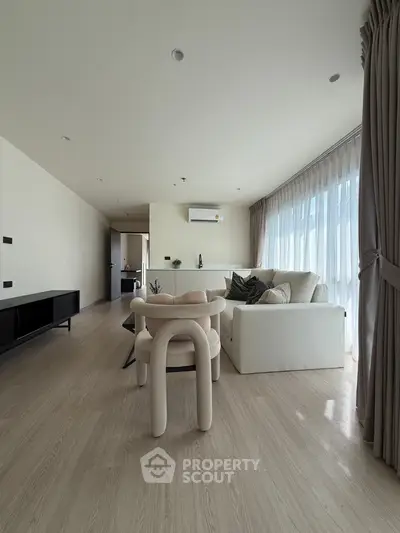 Modern living room with elegant furniture and natural light