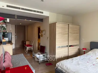 Cozy modern bedroom with wooden wardrobe and stylish decor