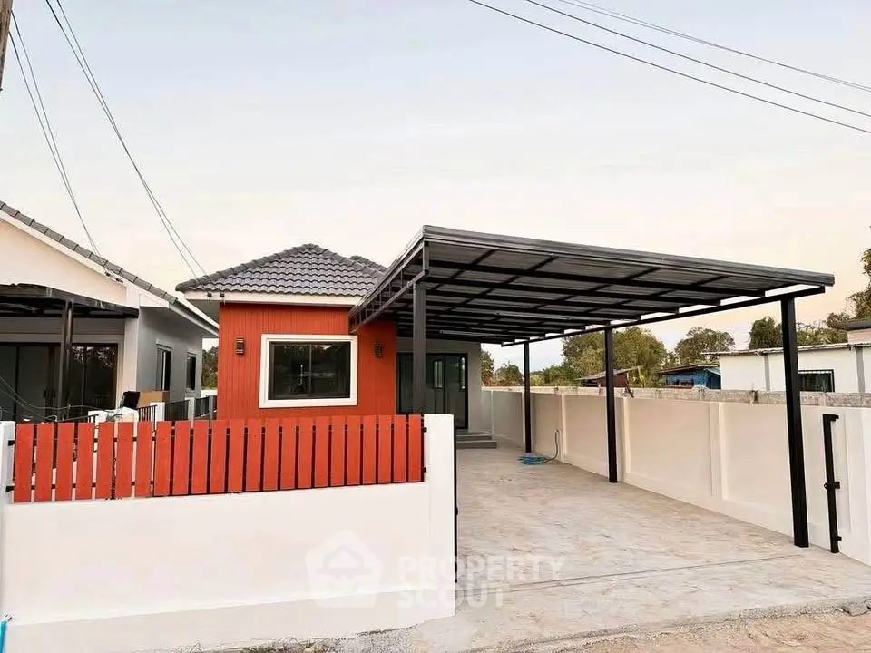 Charming single-story home with modern carport and fenced yard