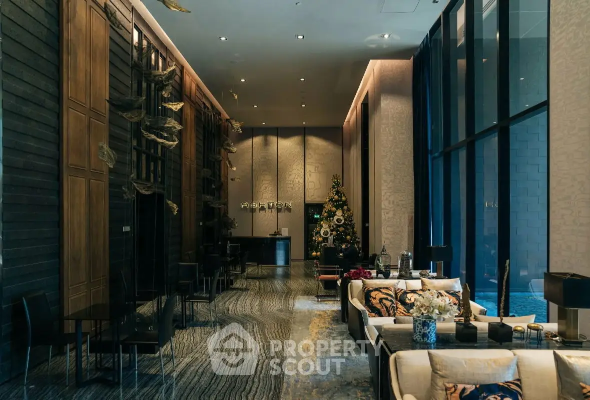 Luxurious modern living room with elegant decor and high ceilings in a premium real estate property.