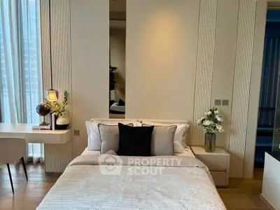 Luxurious bedroom with elegant decor and natural light in modern apartment