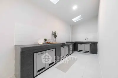 Sleek modern kitchen with minimalist design and ample counter space