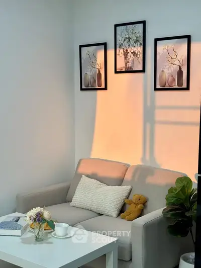 Cozy living room with stylish decor and soft lighting, perfect for relaxation.