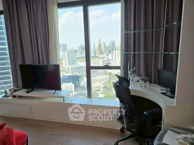 Modern living room with city view, featuring sleek furniture and large windows for natural light.