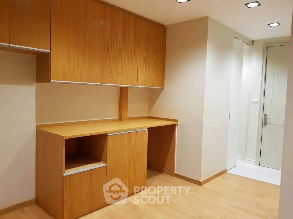 Modern storage room with wooden cabinets and sleek design
