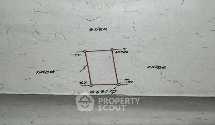 Detailed schematic plan of a property plot with measurements and annotations.