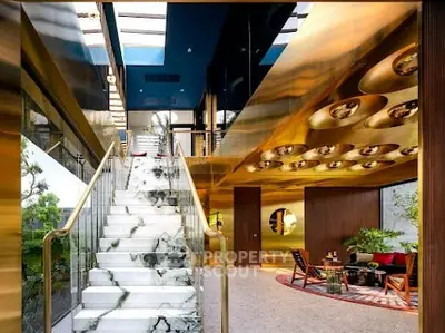 Luxurious modern interior with marble staircase and elegant decor