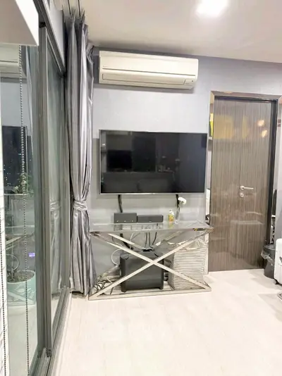 Modern living room with sleek TV setup and stylish decor