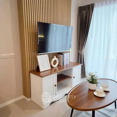 Stylish living room with modern TV setup and elegant decor