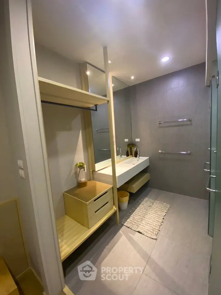 Modern bathroom with sleek design and ample storage space