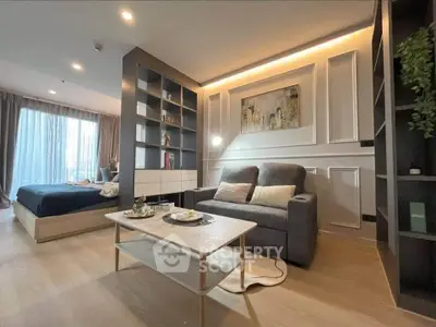 Modern open-plan living room with cozy seating and stylish decor