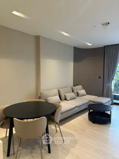 Modern living room with stylish furniture and natural light