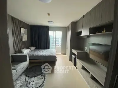 Modern bedroom with sleek design, featuring a cozy bed, stylish sofa, and built-in storage, perfect for urban living.