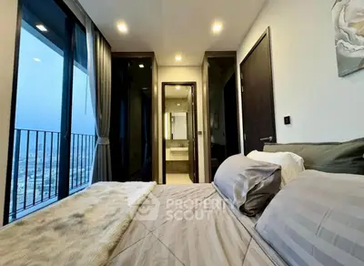 Luxurious bedroom with stunning city view and modern ensuite bathroom