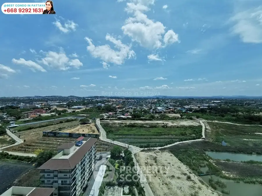 Stunning panoramic view from high-rise condo in Pattaya with clear skies and lush landscape.