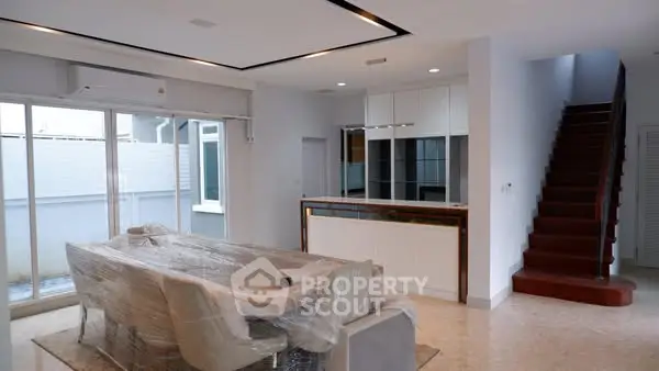 Spacious modern dining area with sleek design and natural light