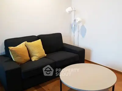 Cozy living room with modern sofa and stylish floor lamp