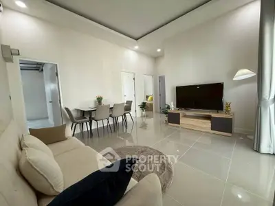 Modern living room with sleek furniture and open layout, perfect for stylish urban living.