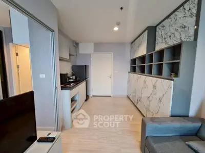 Modern apartment interior with sleek kitchen and stylish living area