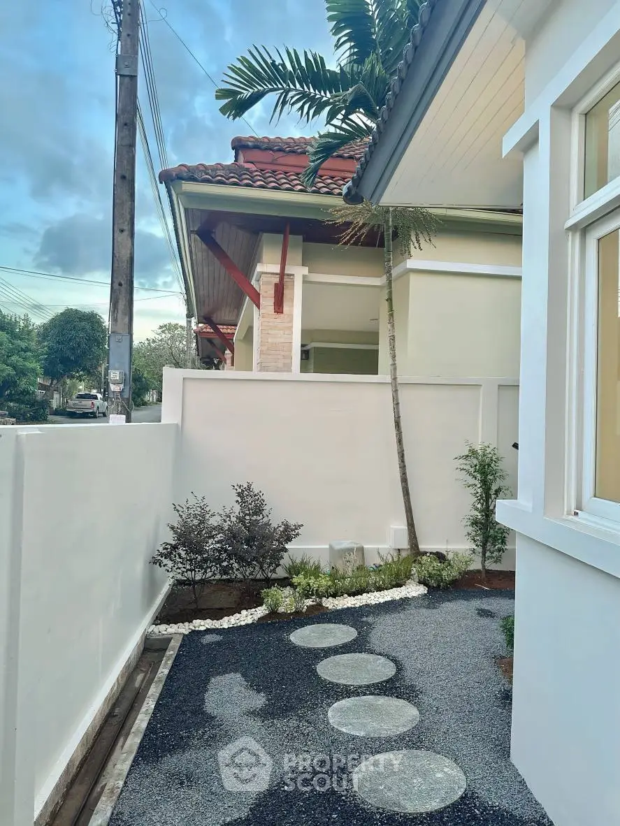 Charming residential exterior with lush garden and modern architecture