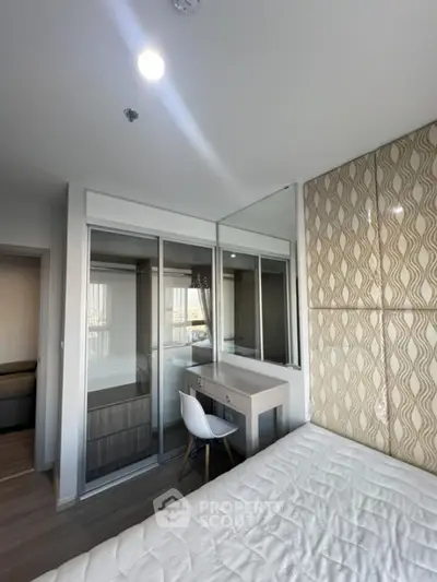 Modern bedroom with stylish decor and built-in wardrobe