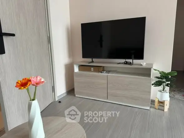 Modern living room with sleek TV stand and minimalist decor