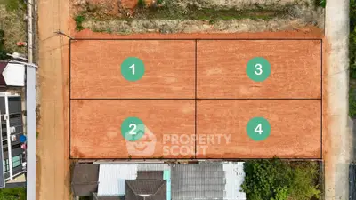 Prime real estate land plot divided into four sections, ideal for development opportunities.