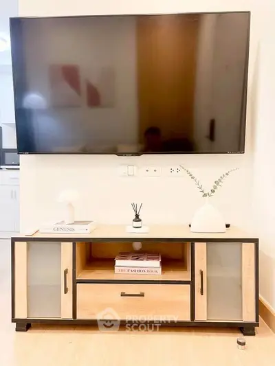 Modern living room with sleek TV setup and stylish decor