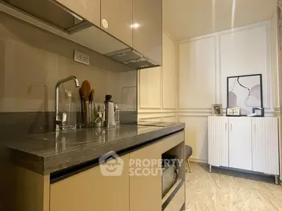 Modern kitchen with sleek cabinetry and stylish decor