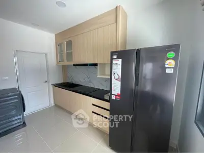 Modern kitchen with sleek appliances and minimalist design