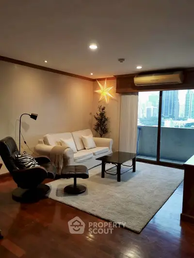 Stylish living room with city view and cozy seating area
