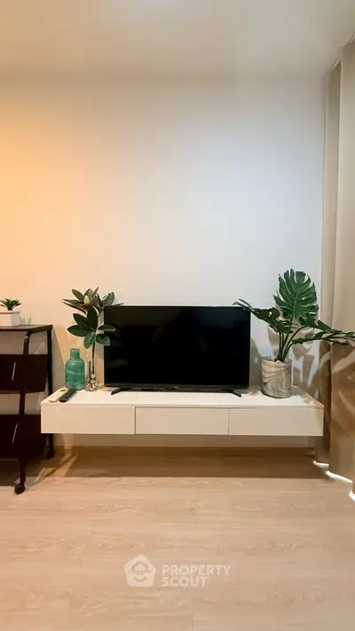 Modern living room with sleek TV stand and stylish decor