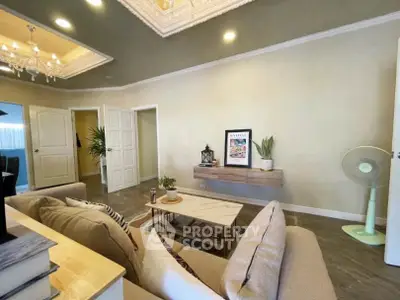 Elegant living room with modern decor and cozy seating area
