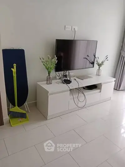 Modern living room with sleek TV stand and minimalist decor