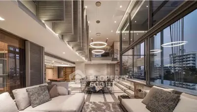 Luxurious modern living room with floor-to-ceiling windows and elegant lighting in a high-rise apartment.