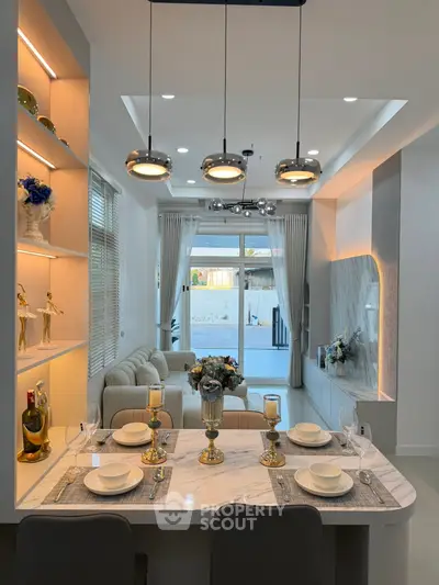 Luxurious modern living room with elegant dining setup and stylish decor