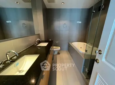 Modern bathroom with sleek design and luxurious bathtub