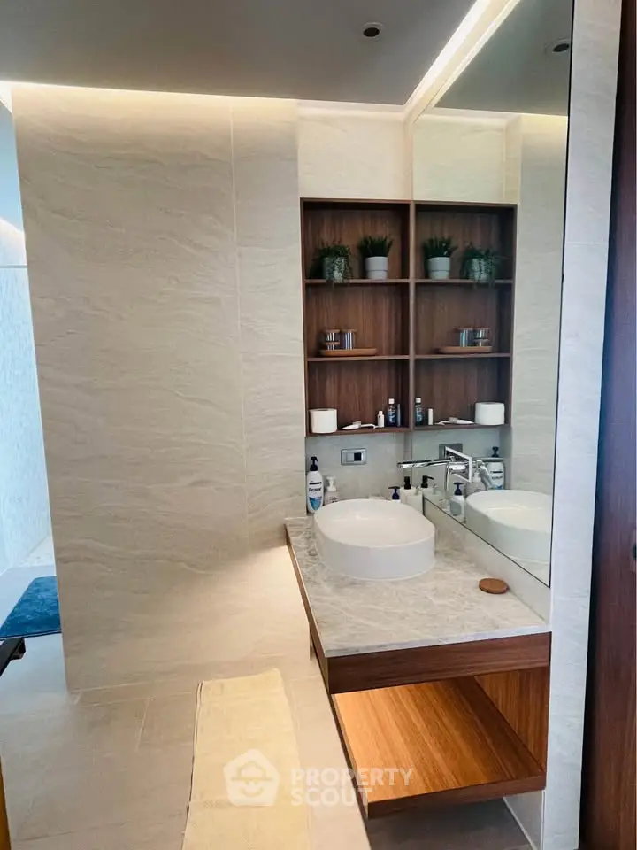 Modern bathroom with stylish vanity and elegant decor